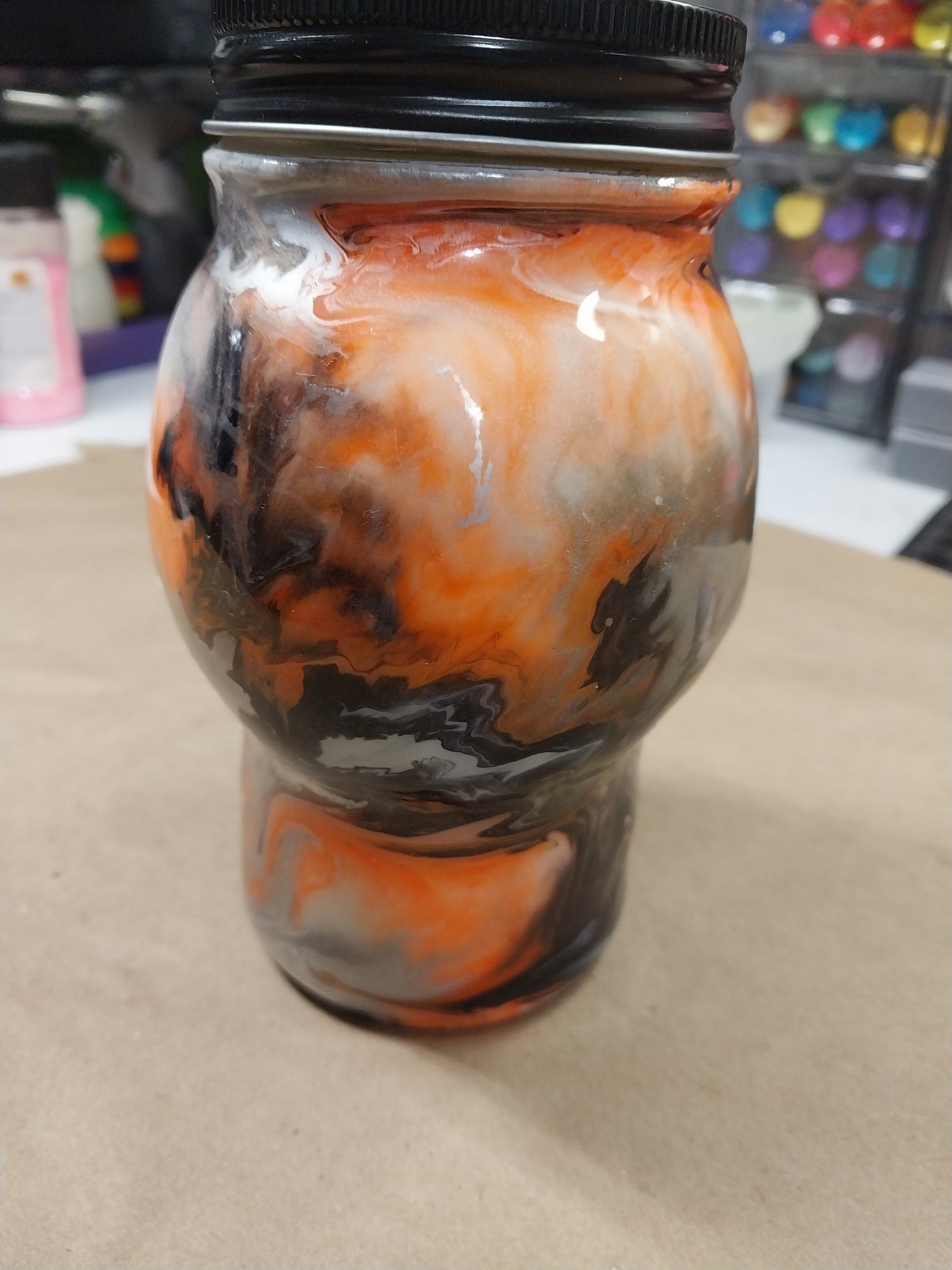 Custom Glass Skull Orange and Black glows in the dark