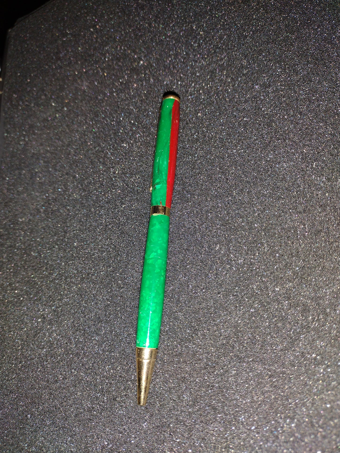 green acrylic with red steip