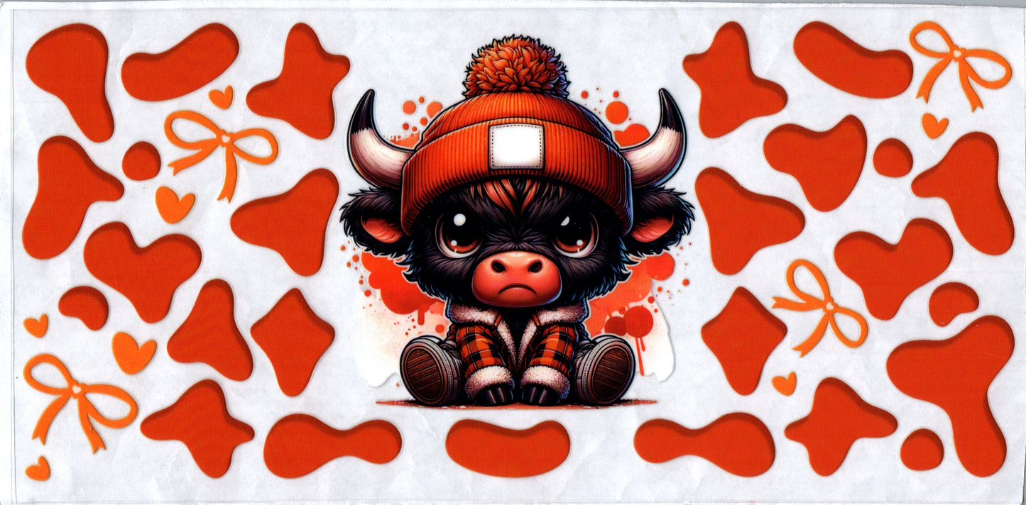 16 oz Black cow in jacket w/orange spots and bows 180
