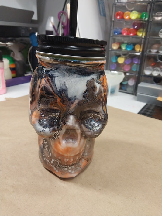 Custom Glass Skull Orange and Black glows in the dark